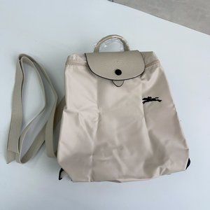 Longchamp dragon inlaid daily travel essentials